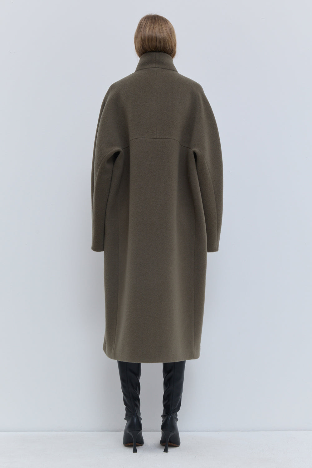 Luxury laurel green wool coat with rounded sleeves