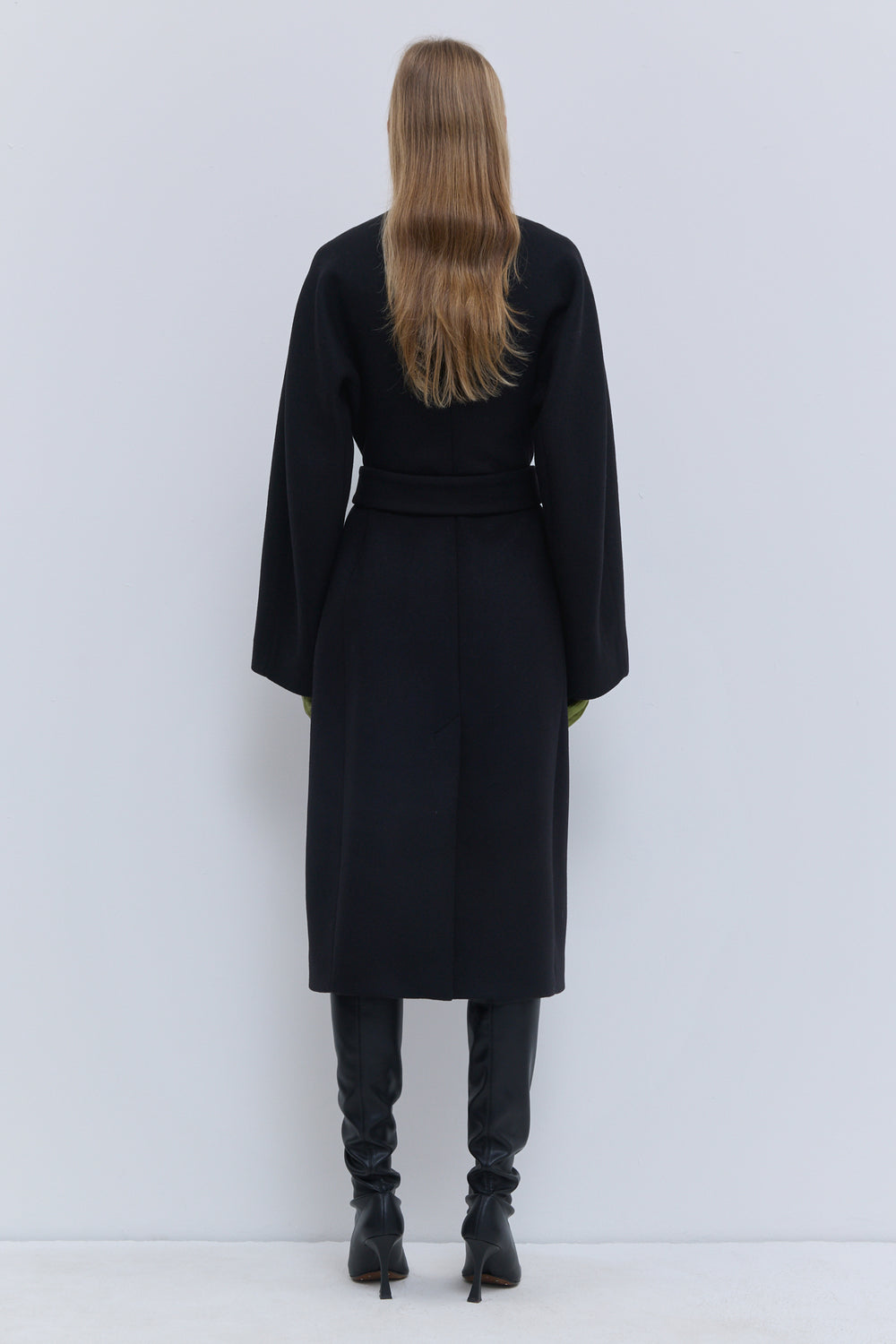 Cumba coat by Christian Wijnants in black wool and cashmere with a wide waist belt