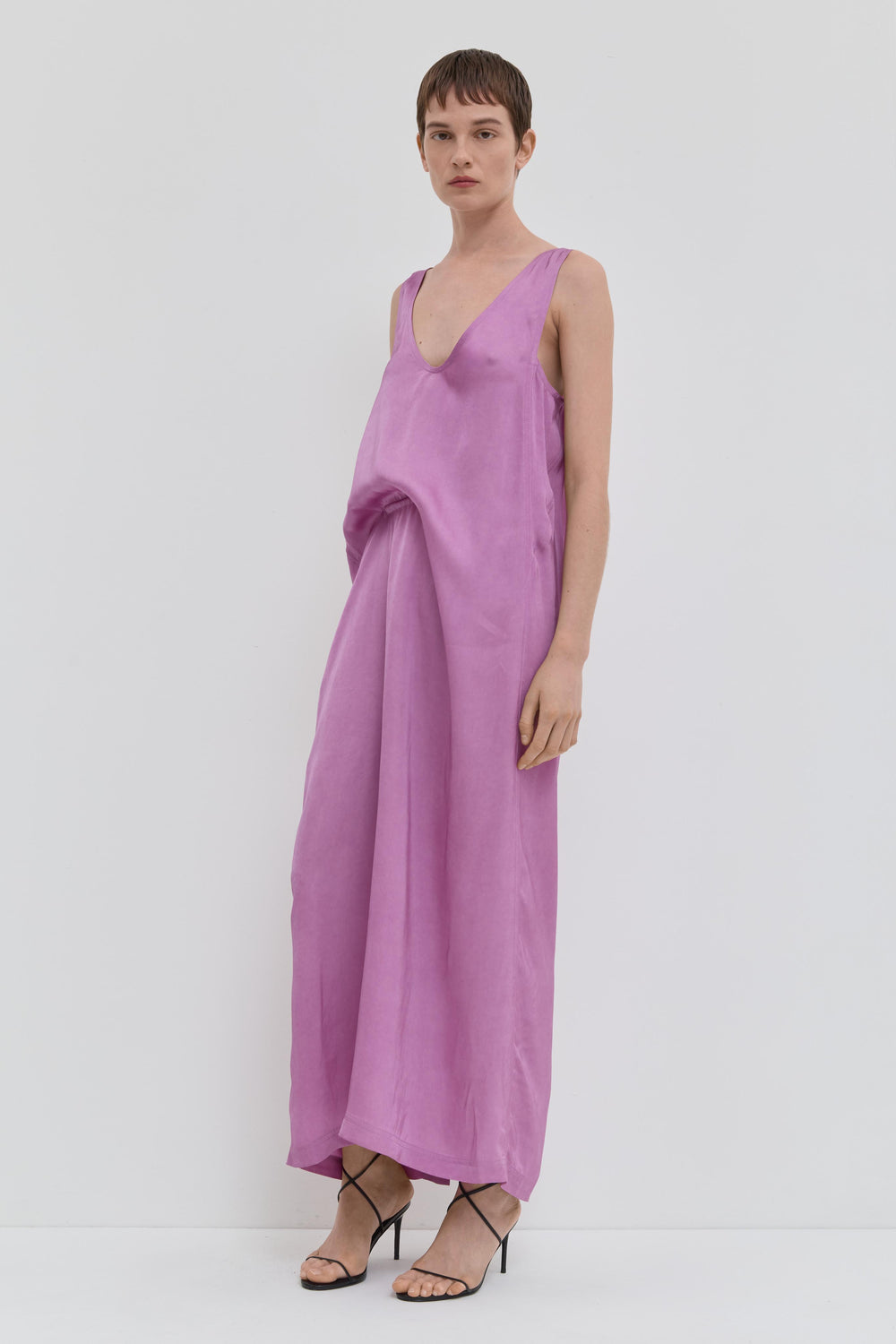 Rosa V-neck maxi dress with draped waist detail and fluid silhouette