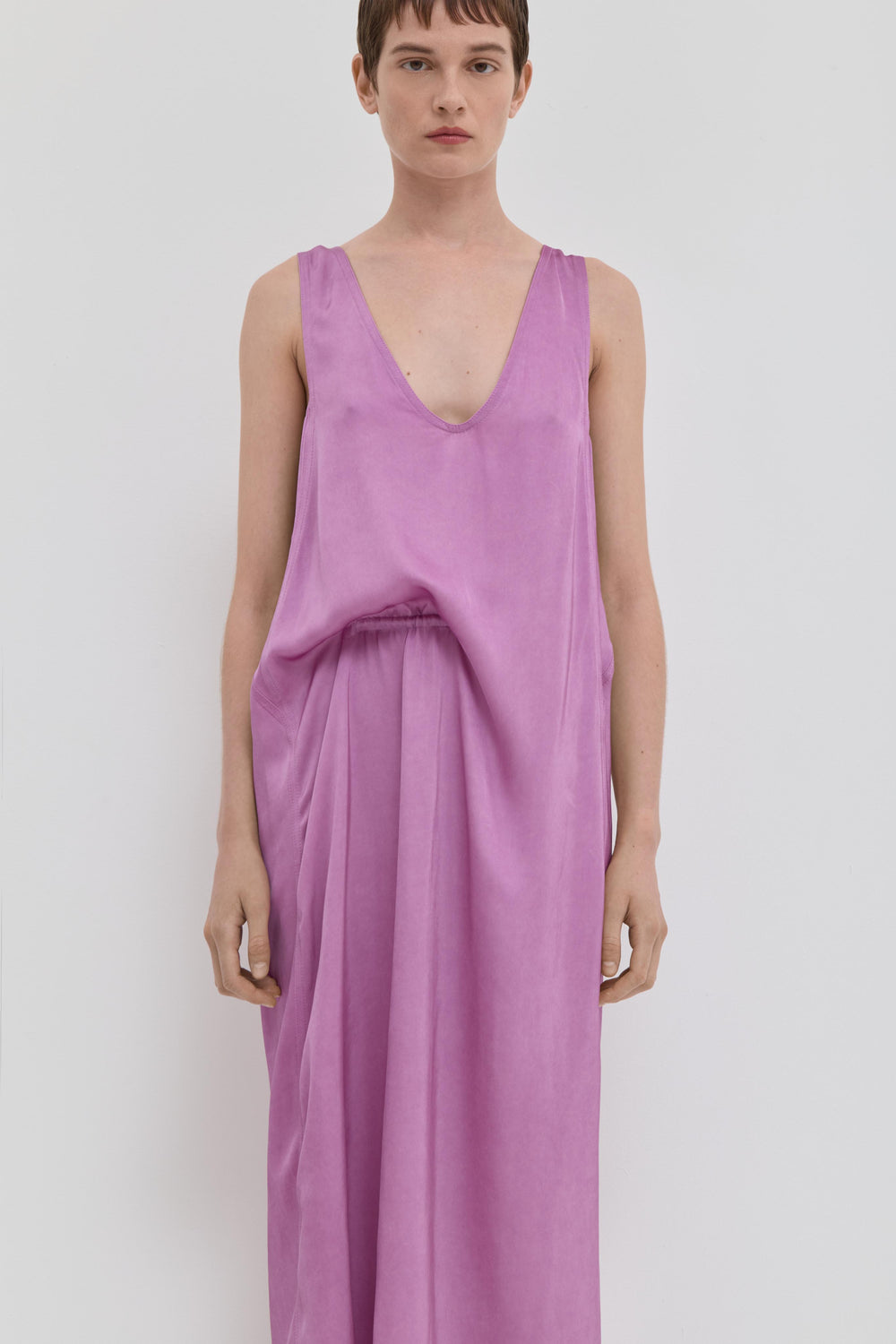 Rosa V-neck maxi dress with draped waist detail and fluid silhouette