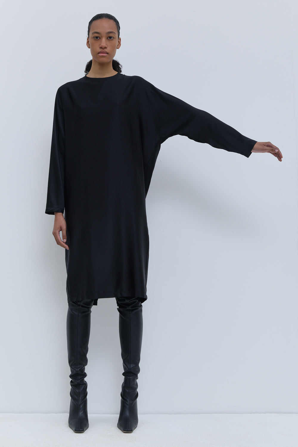 Christian Wijnants women’s black dress with relaxed silhouette and long sleeves