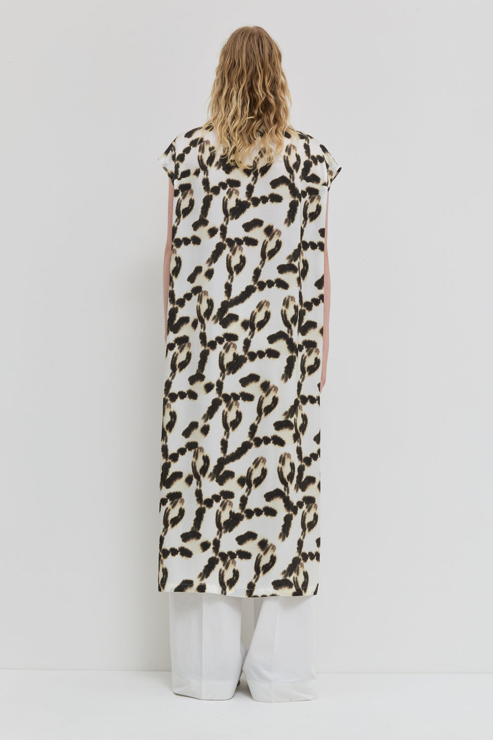 Deralosa belted V-neck dress in Vanilla Magnolia print back view