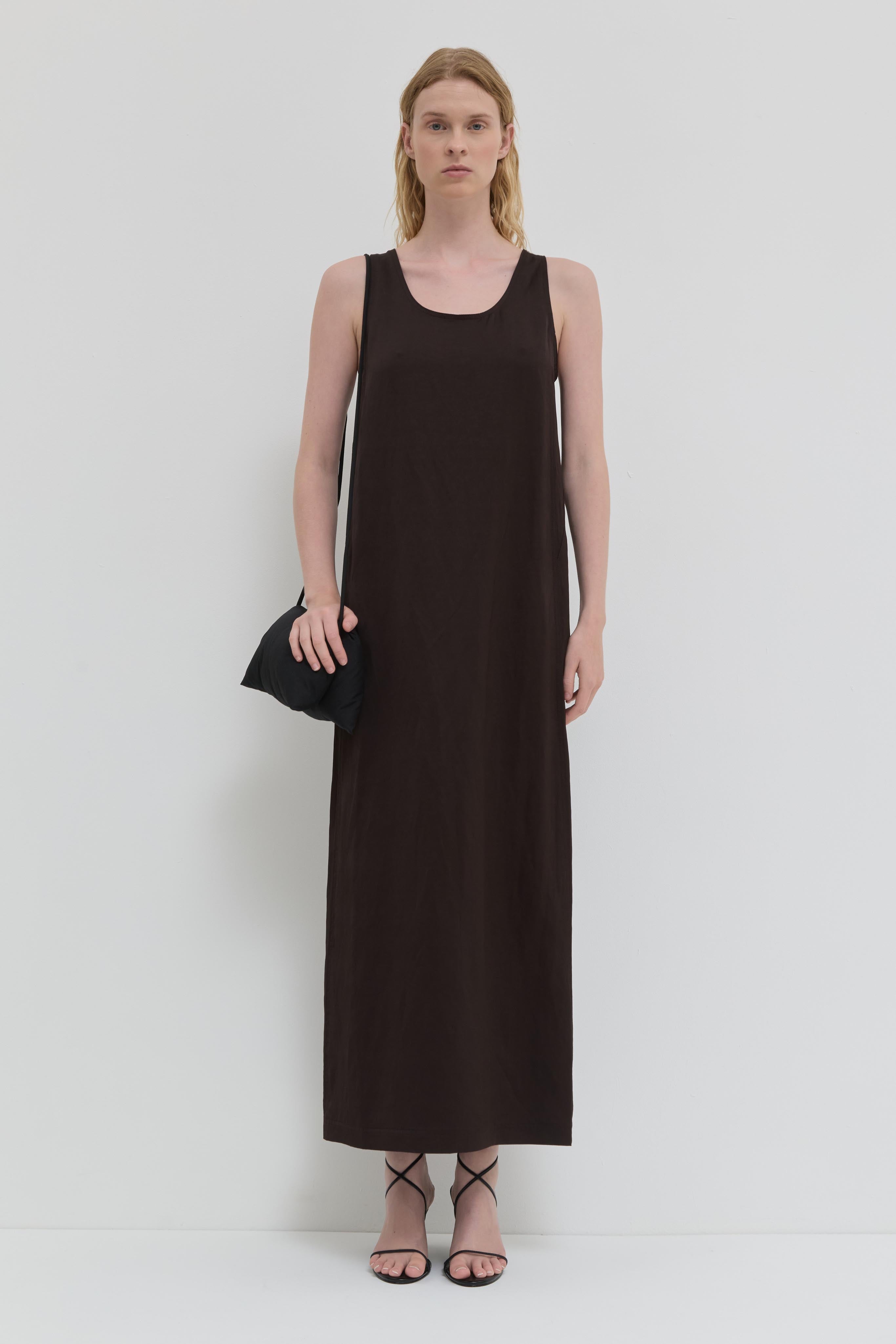 Chocolate tank dress with belt and minimal silhouette