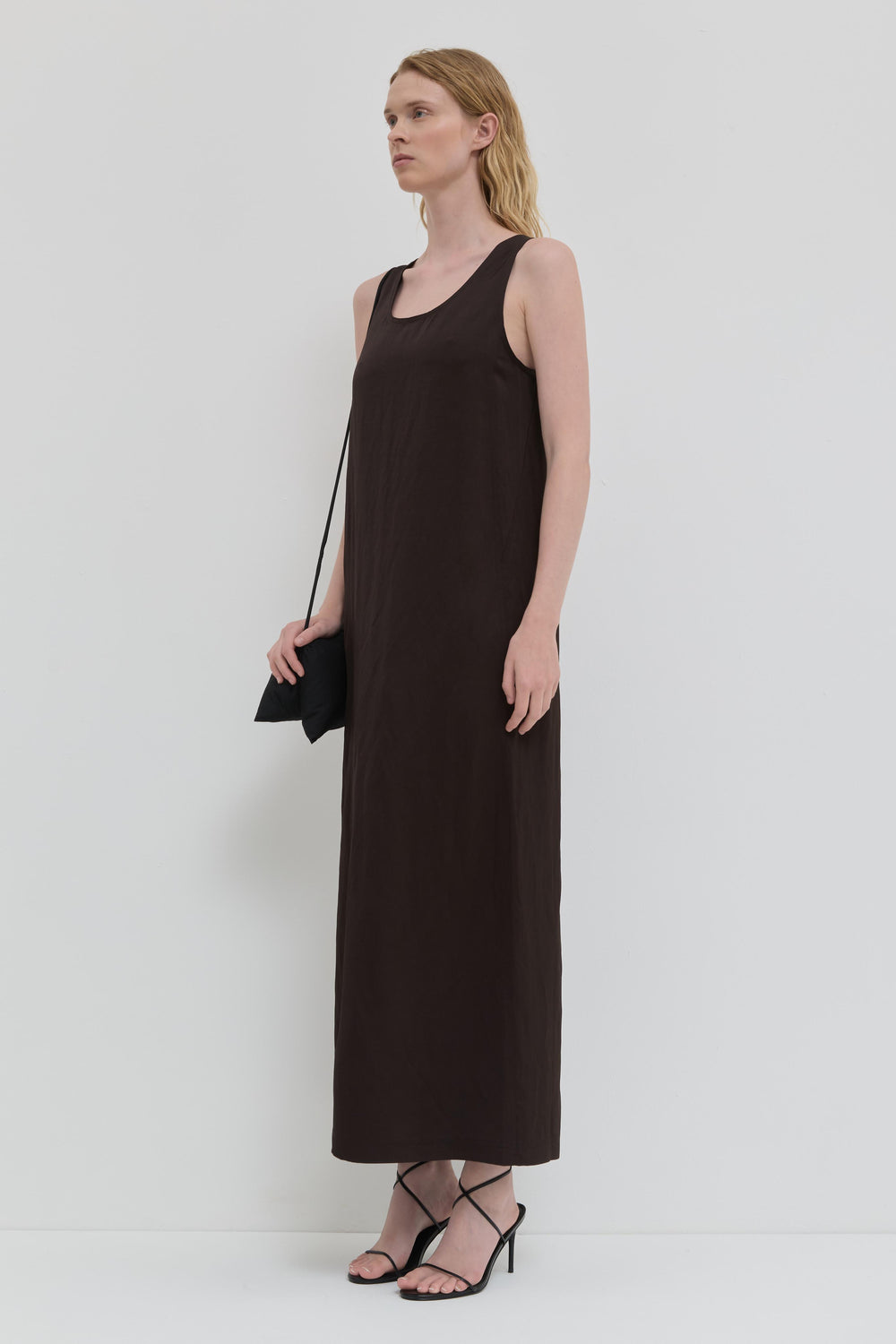 Chocolate tank dress with belt and minimal silhouette