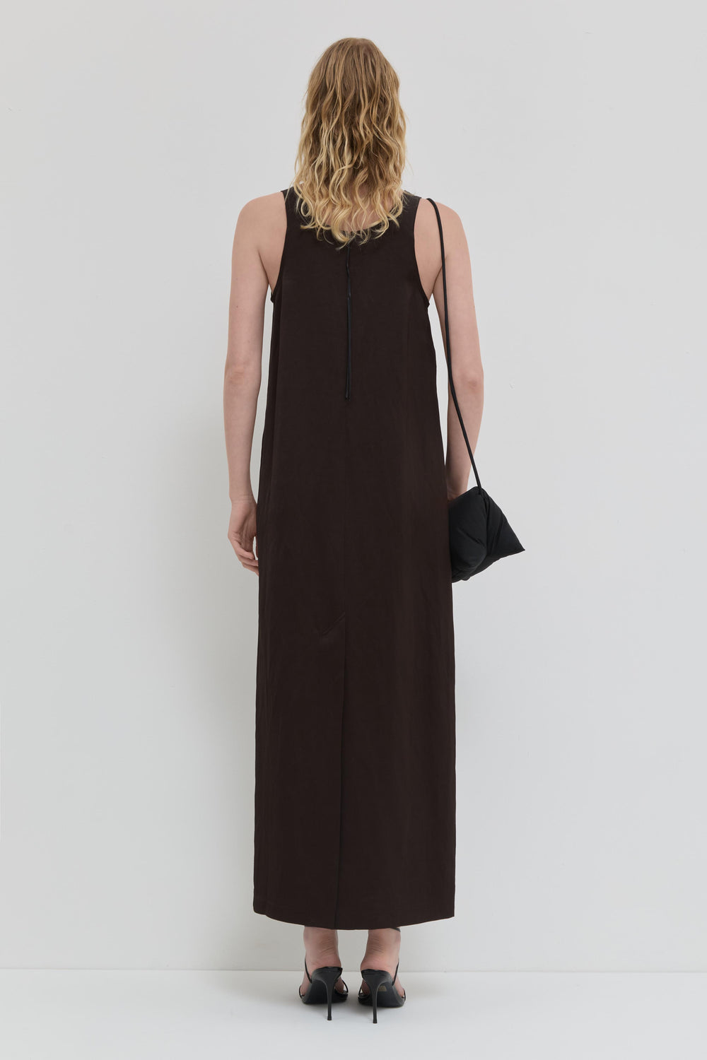 Chocolate tank dress with belt and minimal silhouette