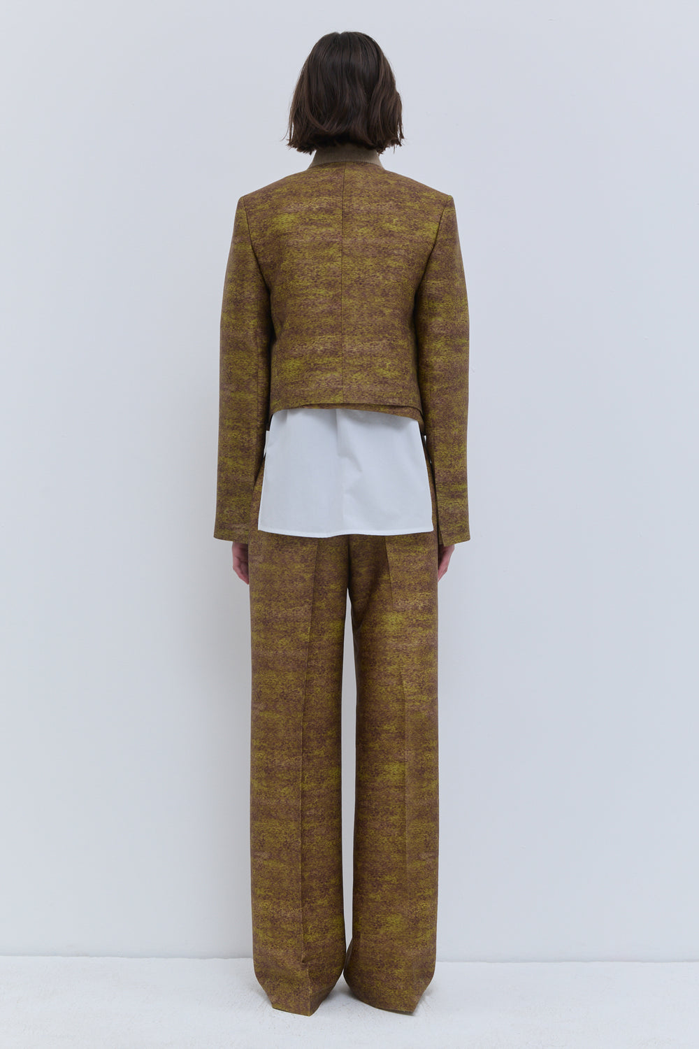 Christian Wijnants cropped gold printed jacket with concealed button closure