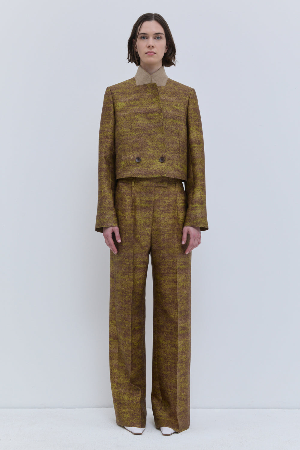 Javas cropped tailored jacket in gold and brown Storm print with structured collar