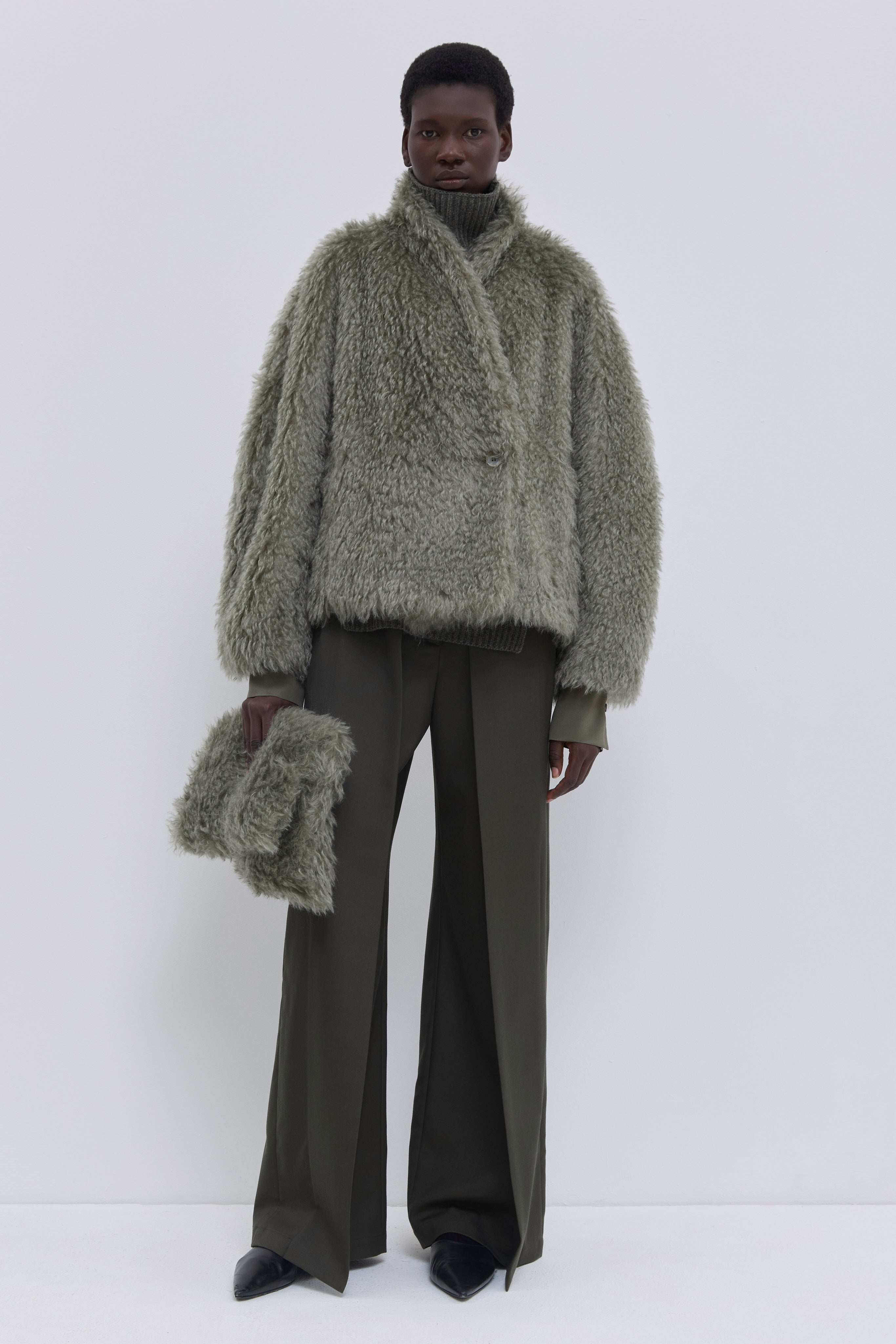 Sage faux fur jacket with shawl collar crafted from Steiff mohair fabric.