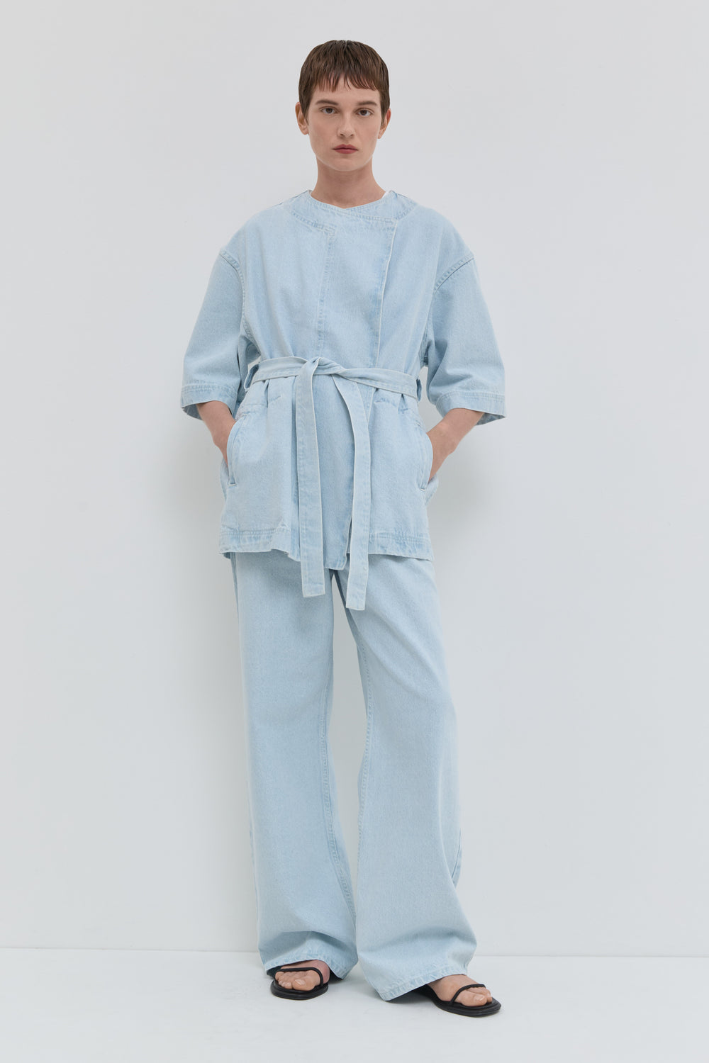 Light blue denim jacket with short kimono sleeves and relaxed fit