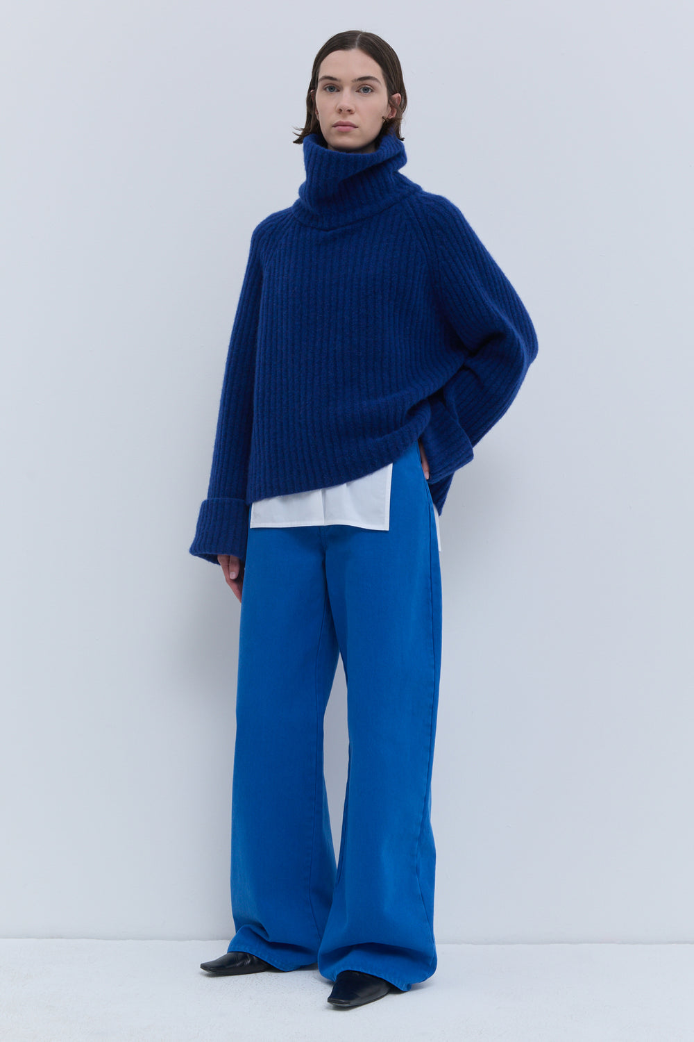 Christian Wijnants deep blue ribbed sweater with wide cuffs