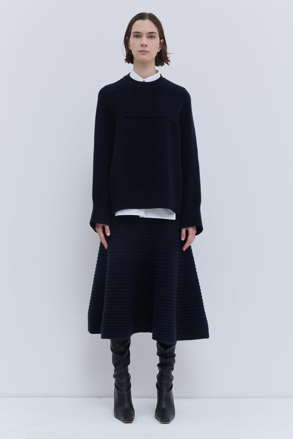 Christian Wijnants dark marine sweater with sculptural rounded sleeves