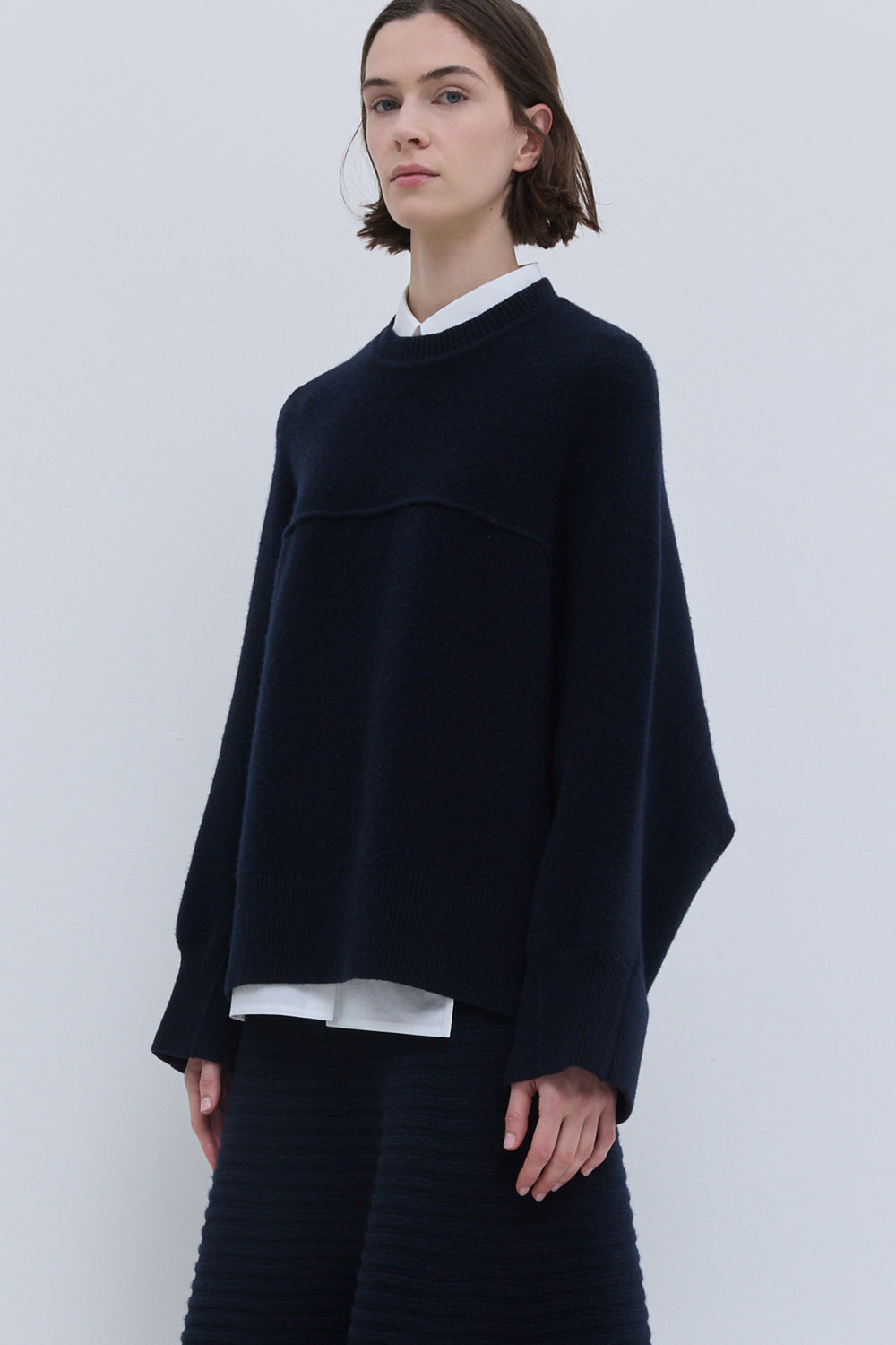Kikki dark marine sweater with horizontal front seam