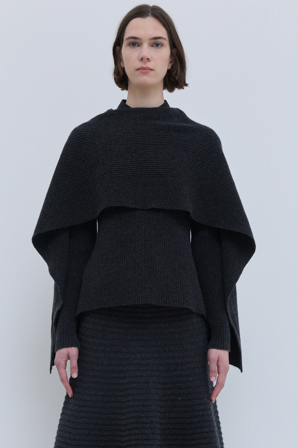 Kovira ribbed knit sweater styled with wide-leg trousers