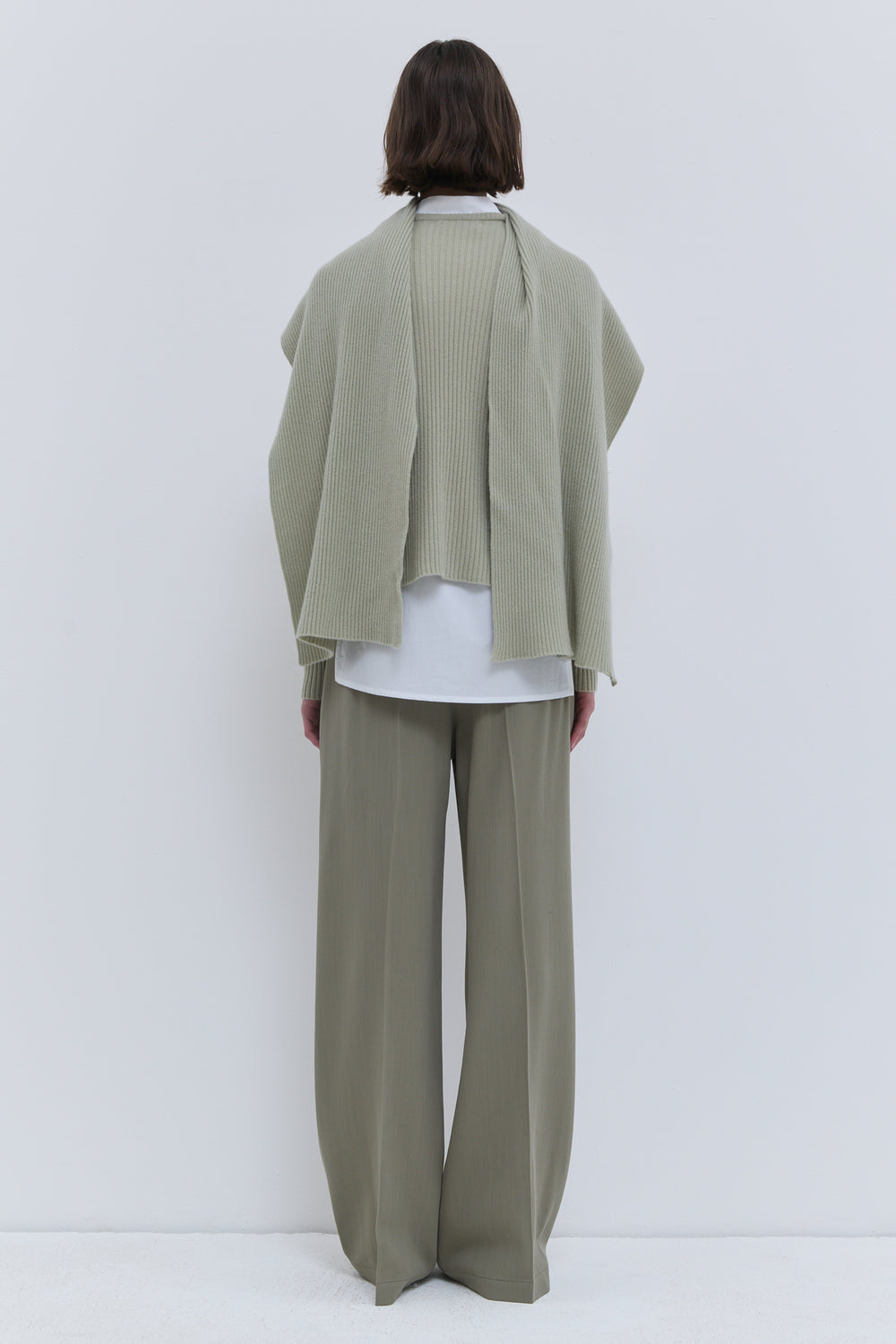 Kovira ribbed knit sweater styled with wide-leg trousers