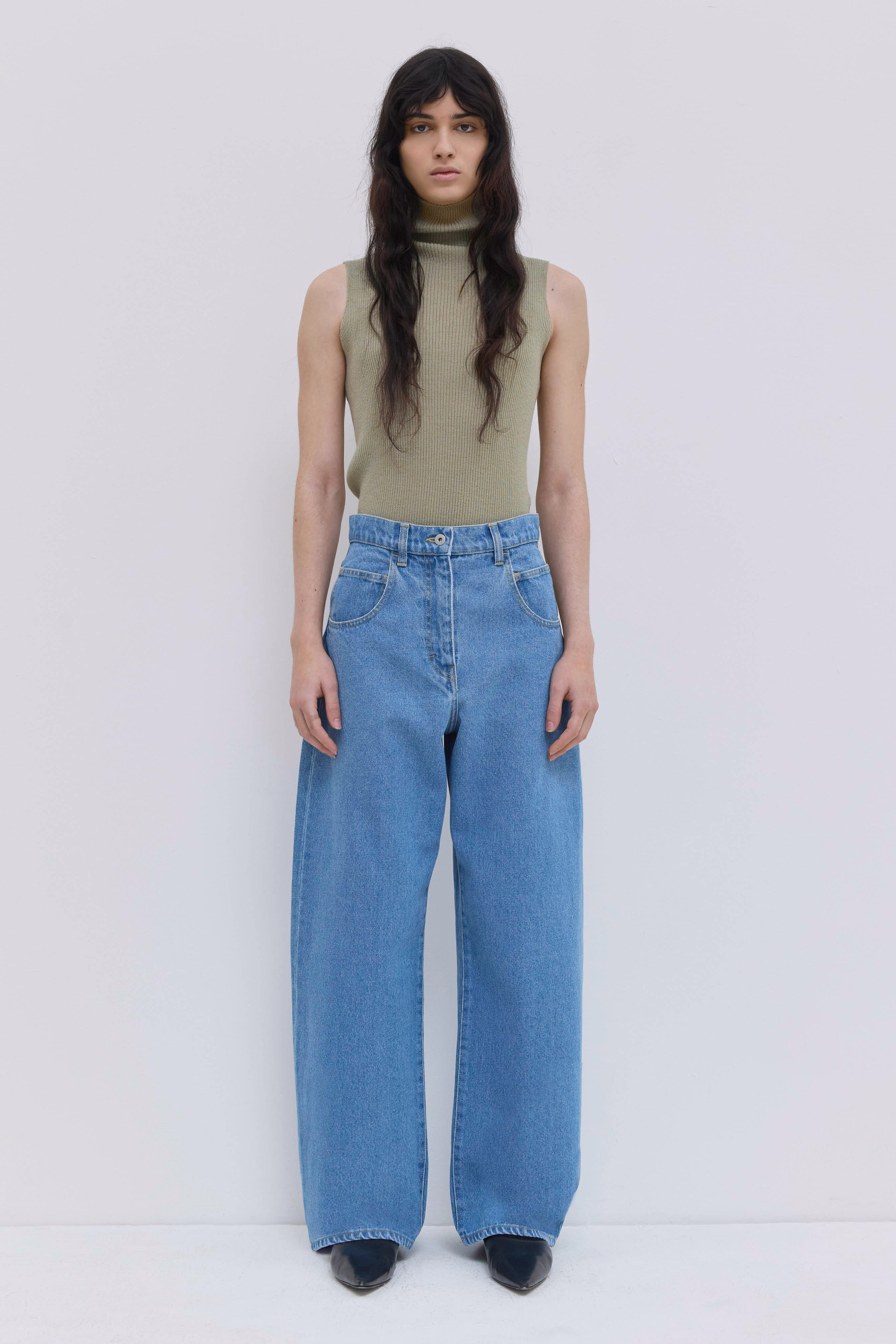 Patan wide-leg light blue washed denim jeans with high-rise waist.