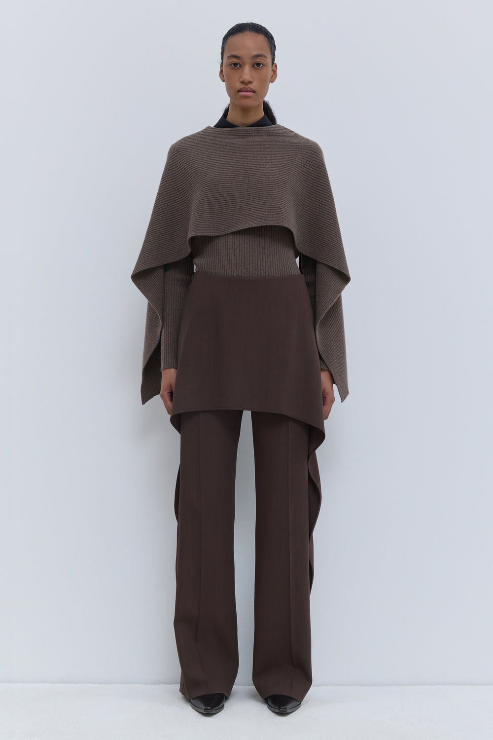 Christian Wijnants Pilba chestnut virgin wool wide-leg trousers with layered skirt overlay, shown from the front