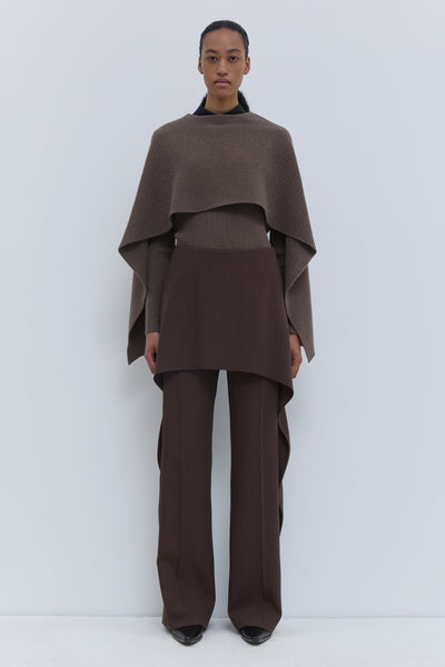 Christian Wijnants Pilba chestnut virgin wool wide-leg trousers with layered skirt overlay, shown from the front
