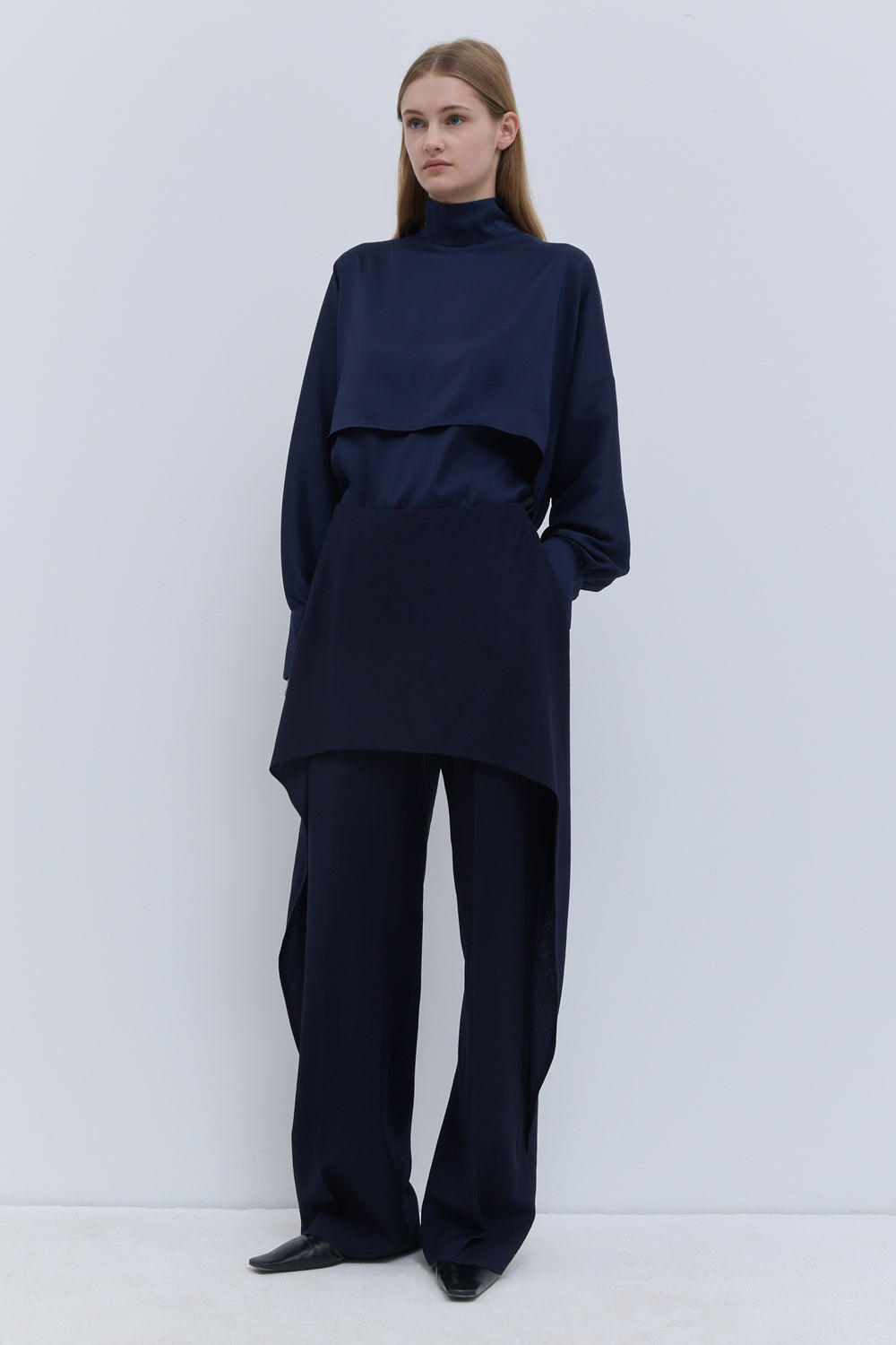 Christian Wijnants dark navy conceptual trousers in 100% virgin wool with an asymmetrical layered skirt panel