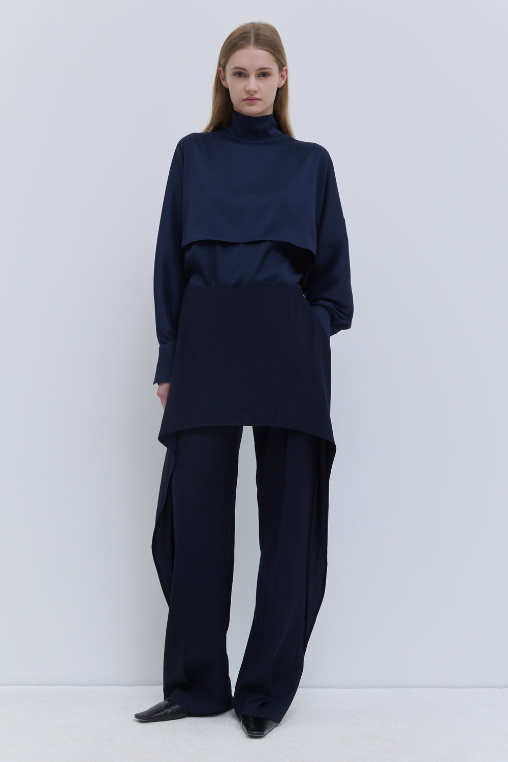 Christian Wijnants Pilba wide-leg dark navy wool trousers with a skirt overlay and tailored silhouette