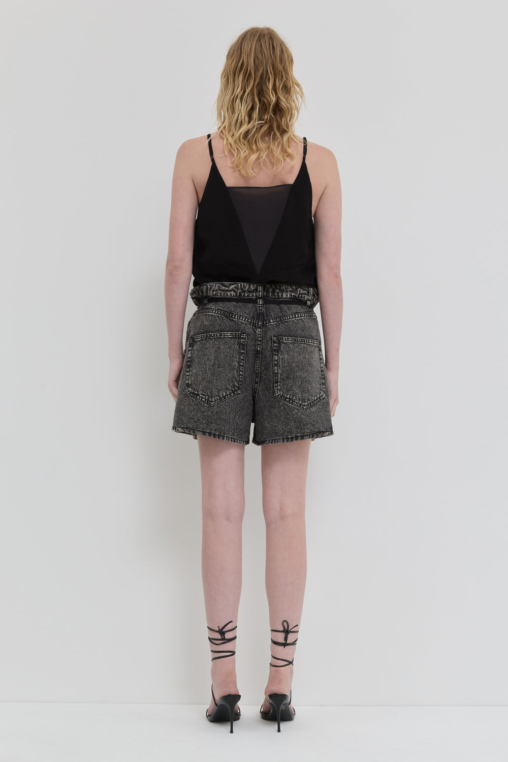 Dark denim shorts with folded waistband and belt detail