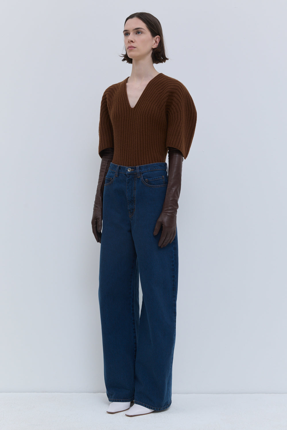 Pullos blue wash denim jeans, back view, showcasing the wide-leg fit, high-rise waist and classic denim construction.