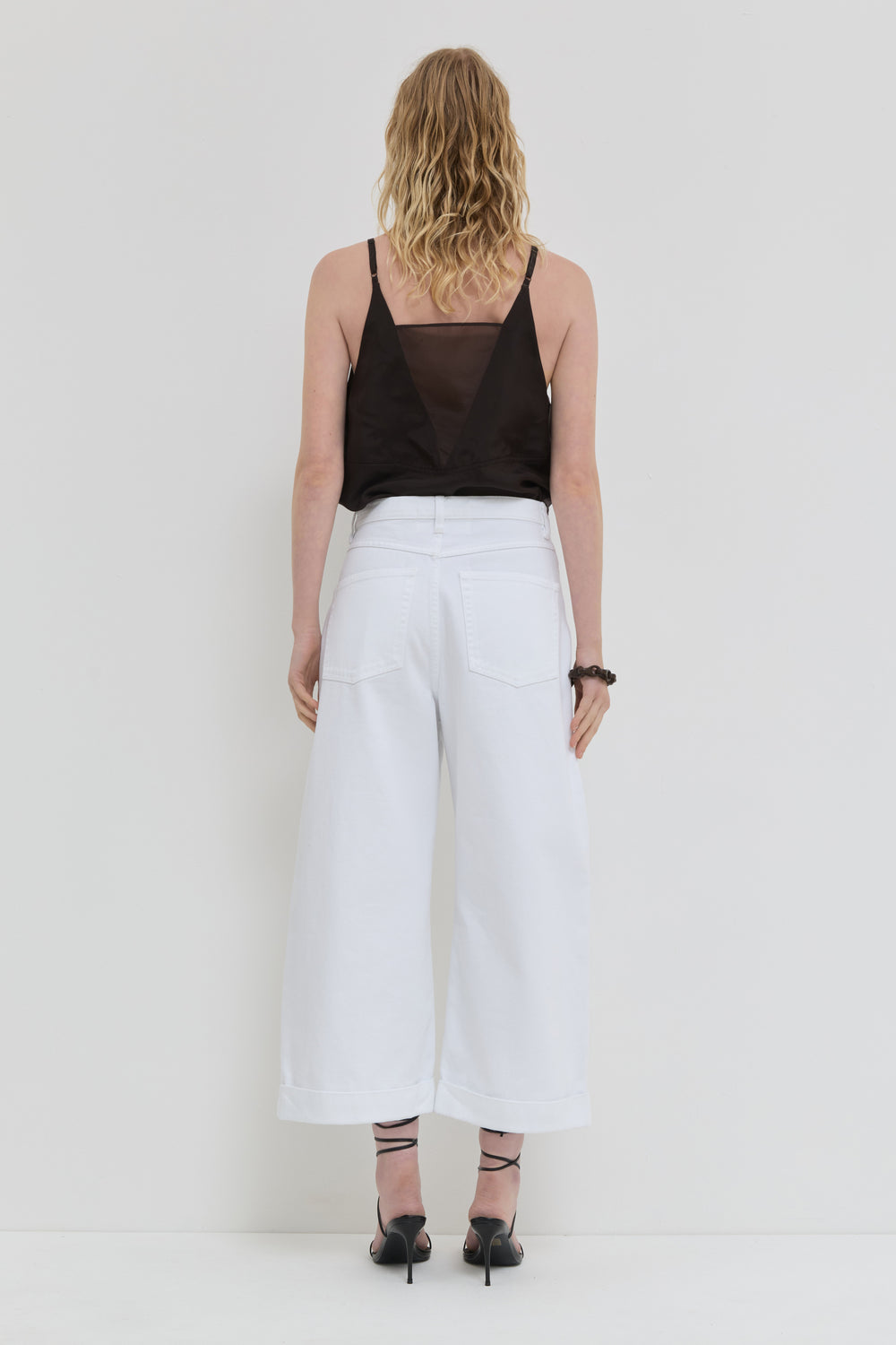 Optical white wide leg cropped jeans with cuff detail back view