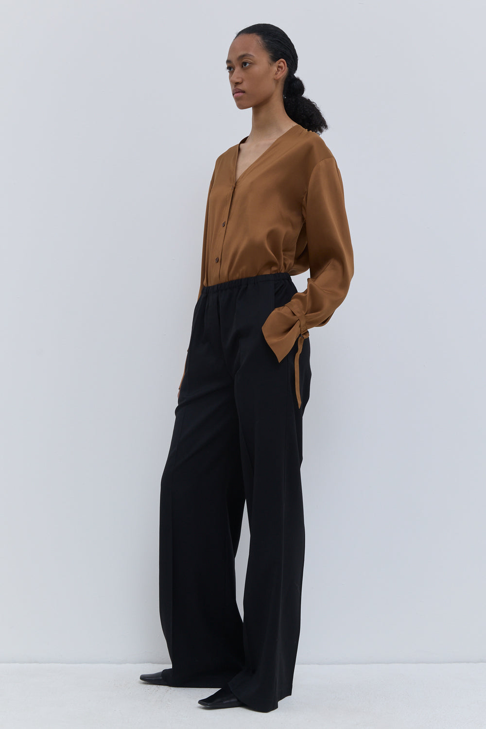 Christian Wijnants Pune dark navy virgin wool straight-leg trousers with elasticated waistband, front view