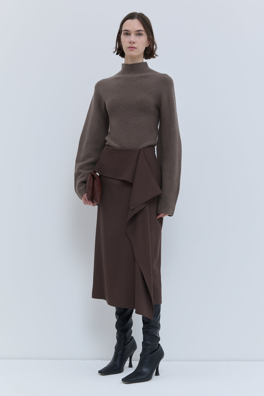 Christian Wijnants Sailo chestnut midi skirt with draped front panel, back view.