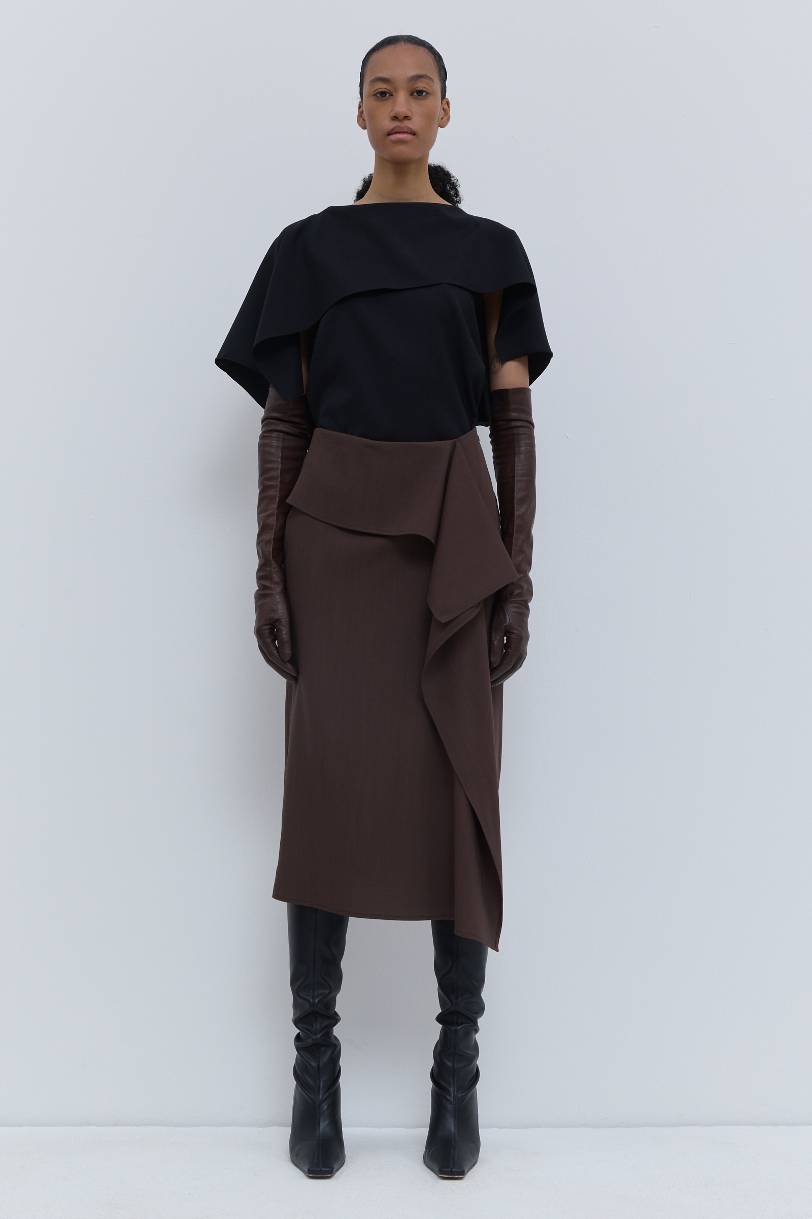 Christian Wijnants Sailo chestnut skirt with asymmetric front drape, front view.