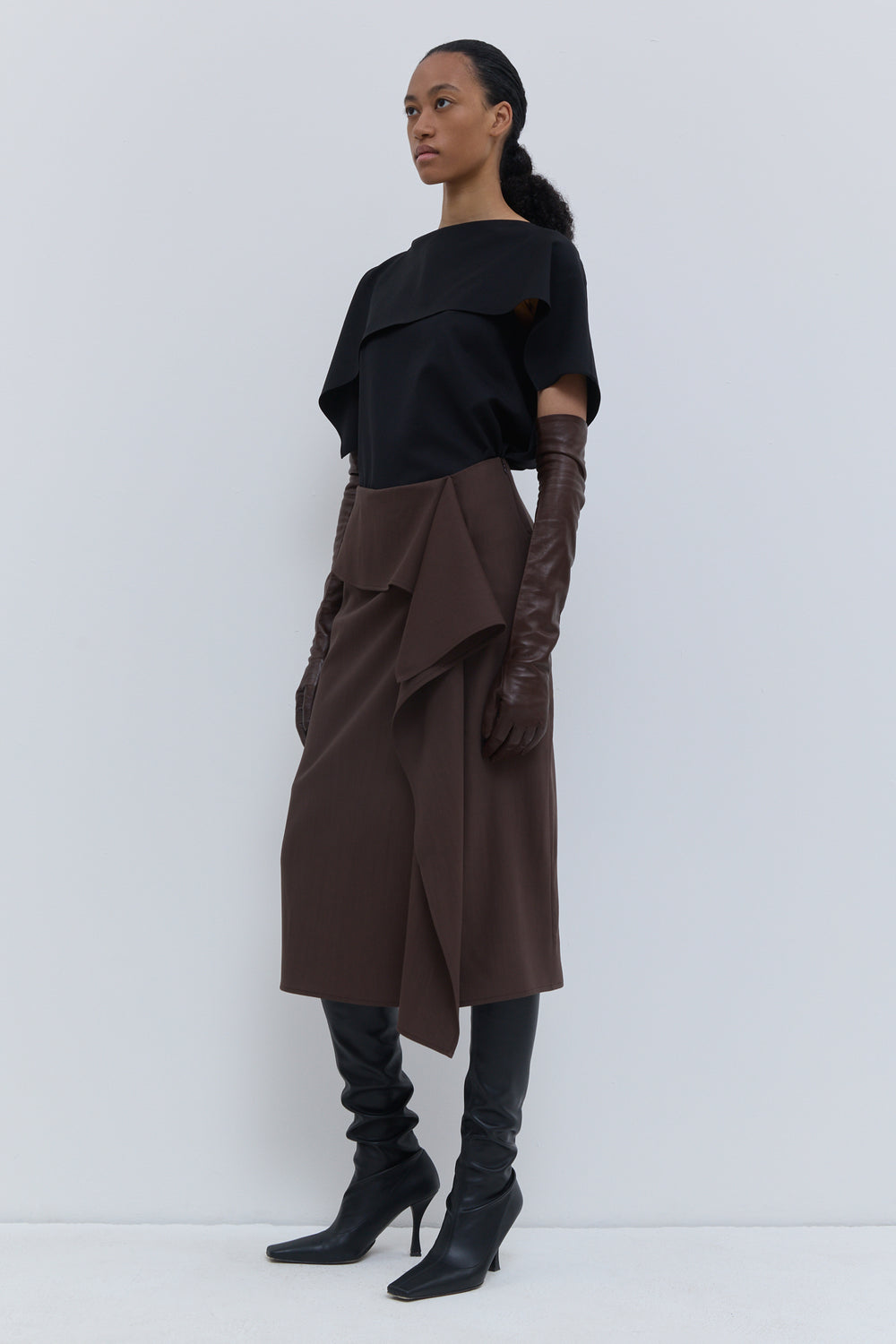 Christian Wijnants Sailo chestnut skirt with layered draped panel, front view.