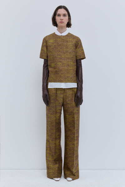 Front view of the Gold Storm printed wool and silk fitted short-sleeve top with side slits.