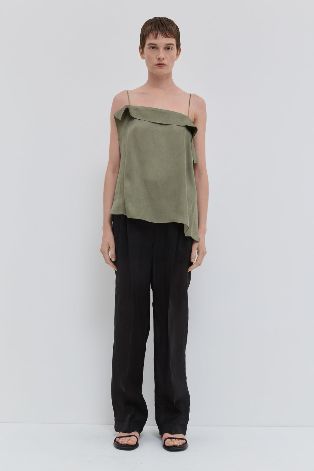 Dark sage asymmetric top with thin straps and draped neckline