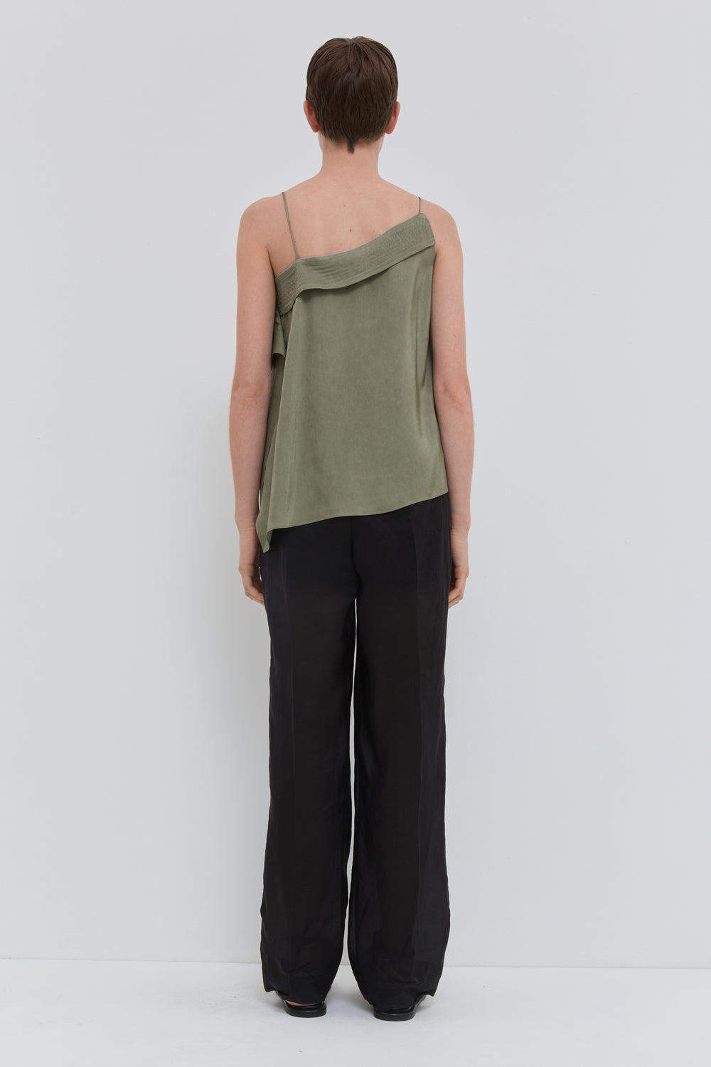 Dark sage asymmetric top with thin straps and draped neckline