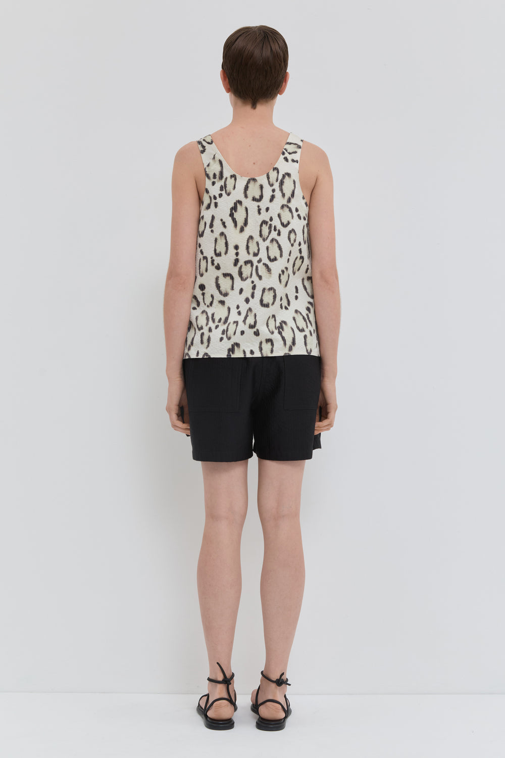 Smoke panthera V-neck top in quilted fabric with side panels back