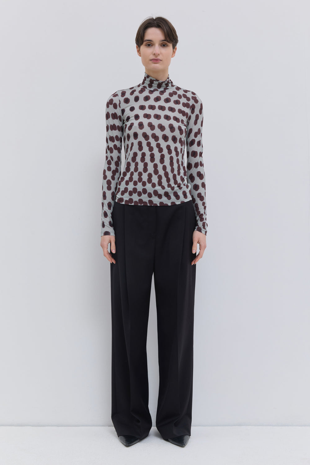 Tugal turtleneck top in stretch jersey with exclusive plum polka print.