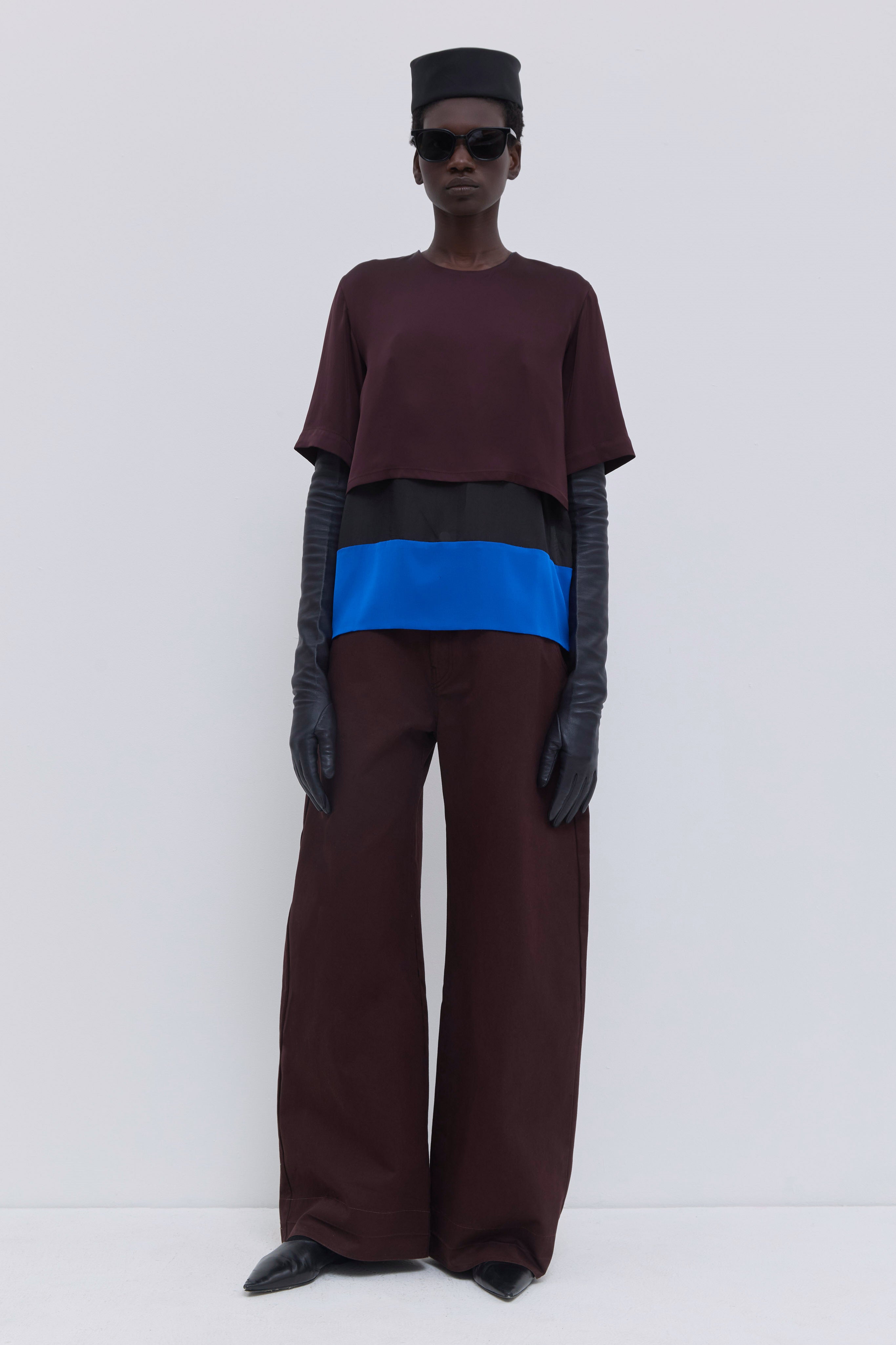 Christian Wijnants Tuno colourblock silk top in plum and cobalt, featuring short sleeves and a layered design.